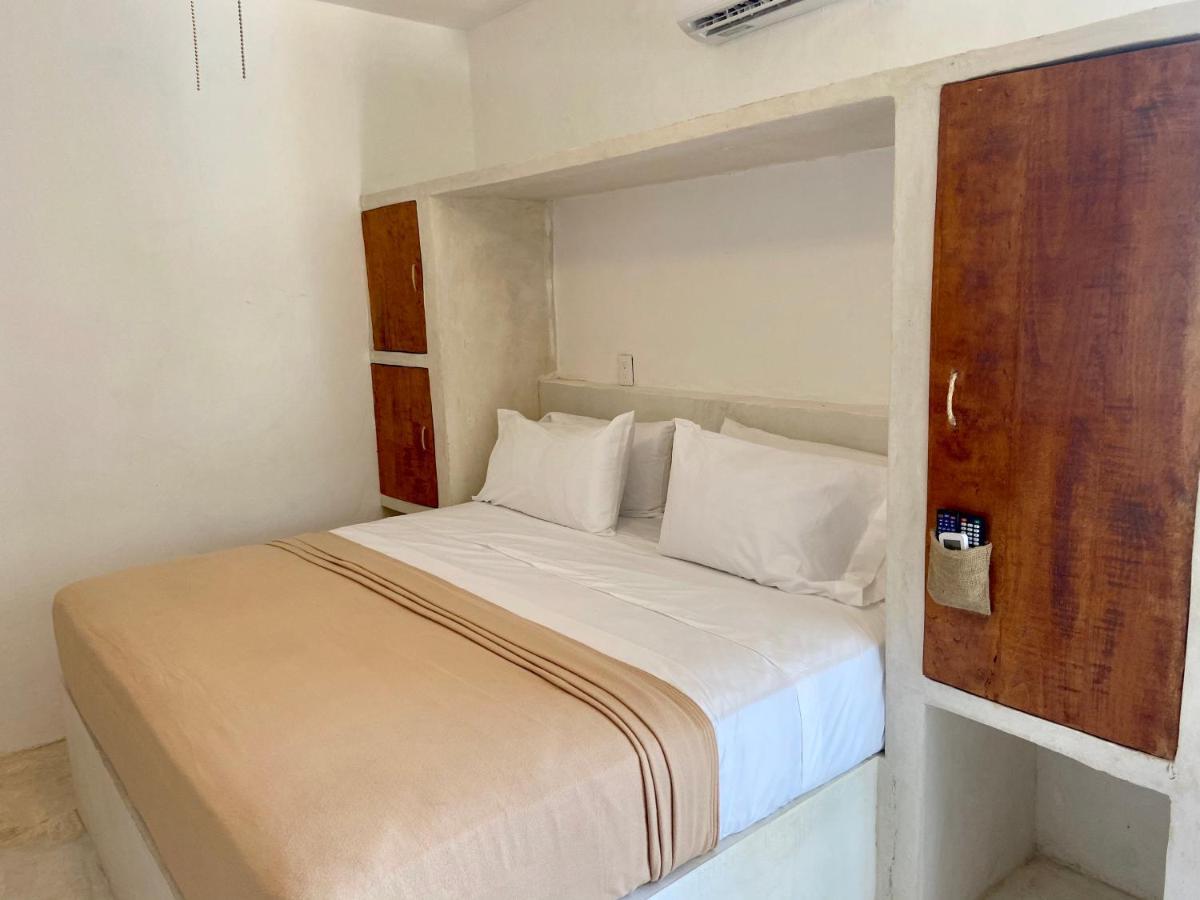 Mio Cancun Hotel Boutique Kültér fotó A bedroom in the hotel